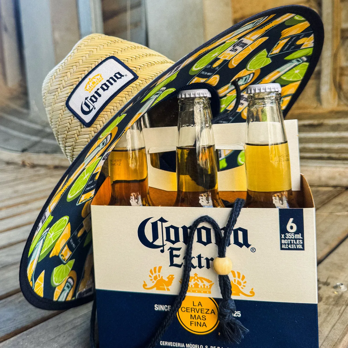 A Corona straw hat over a six pack