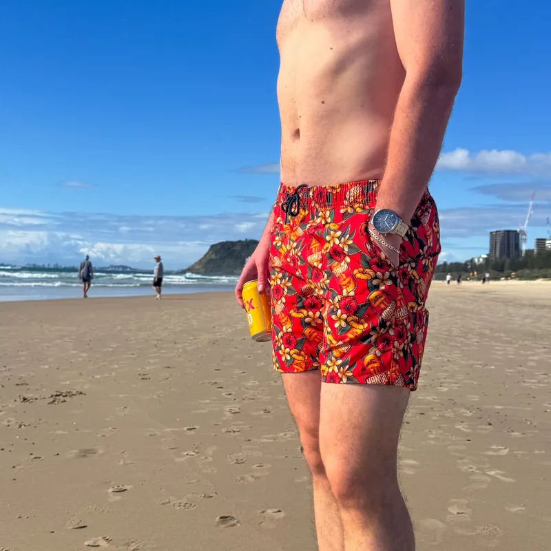 Printed swim shorts on the beach